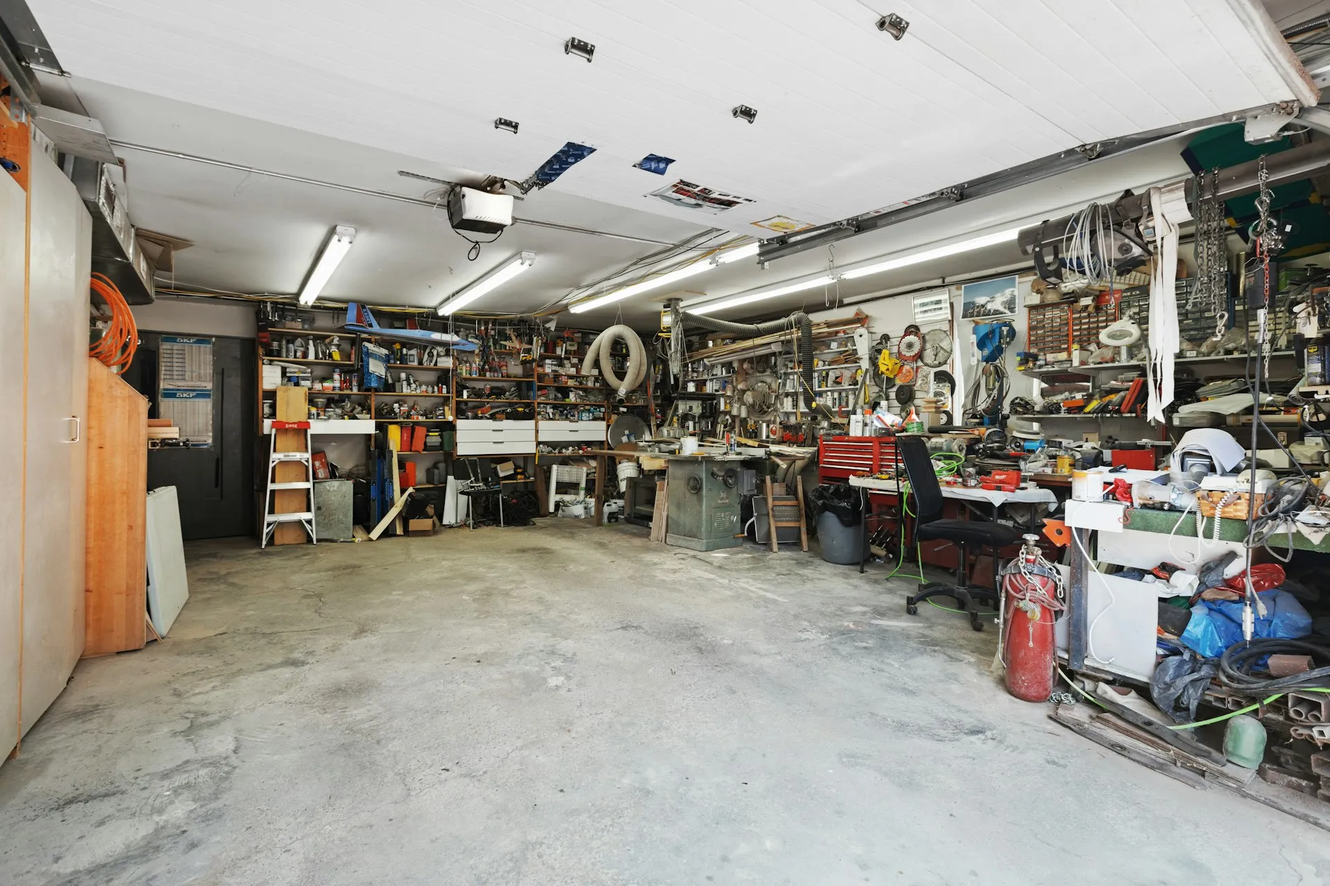Cluttered garage ready for clearance Lets Clear Woking