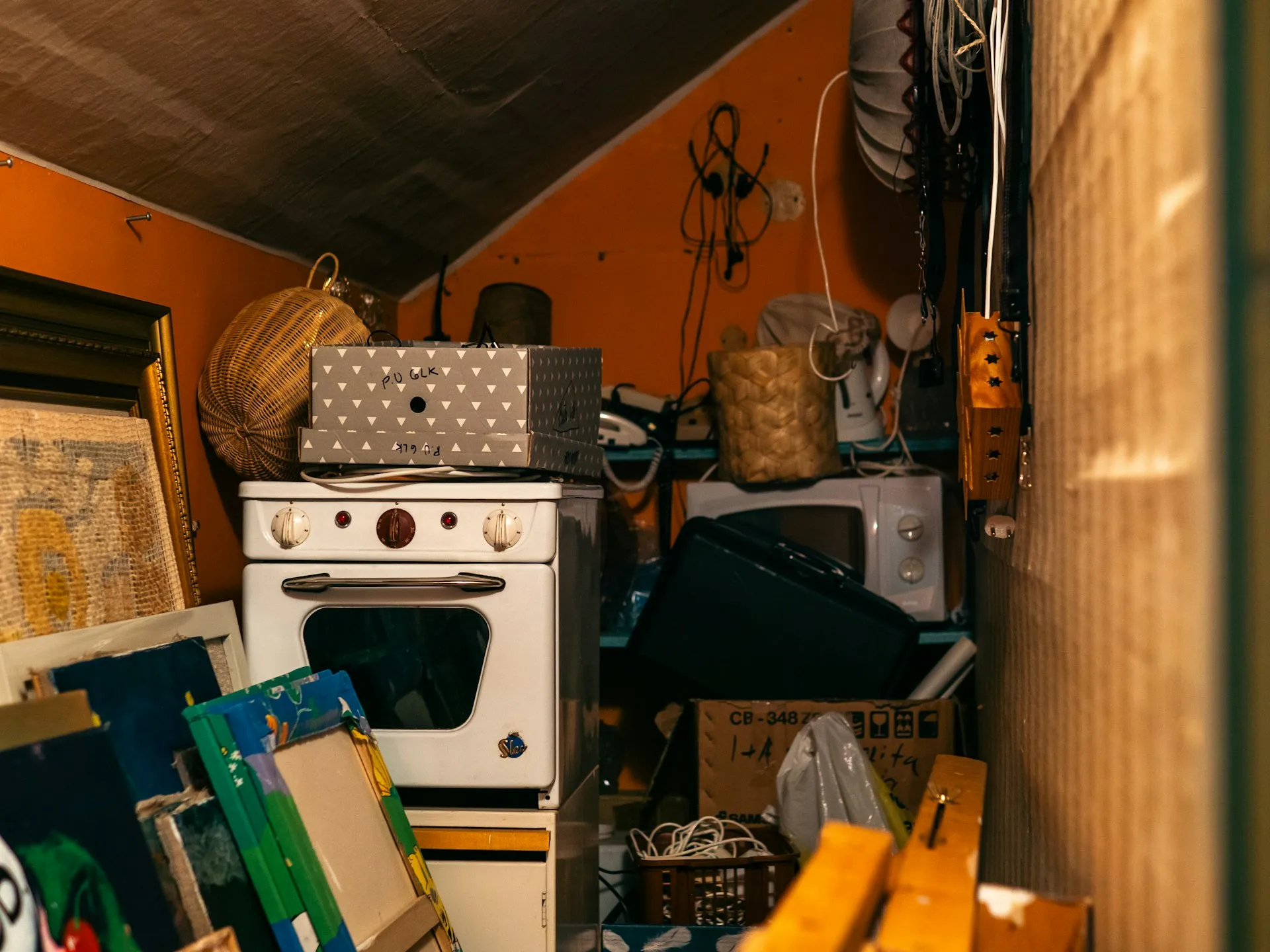 Cluttered room ready for house clearance Lets Clear Woking